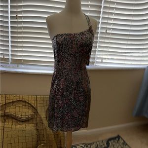 Sequin stretch fabulous fit with diagonal strap over the shoulder